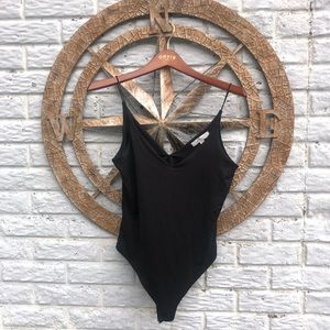 2 body-suits. 1 Black and 1 White.